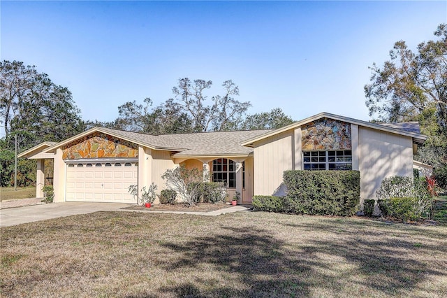 ranch-style house with a garage and a front lawn