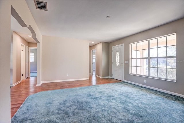 entryway featuring plenty of natural light and light wood-type flooring