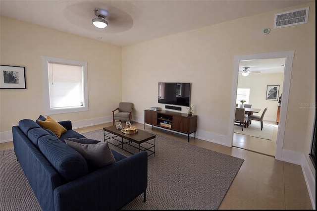 living room with ceiling fan