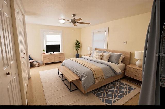 bedroom featuring ceiling fan