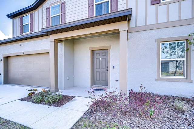 entrance to property featuring a garage