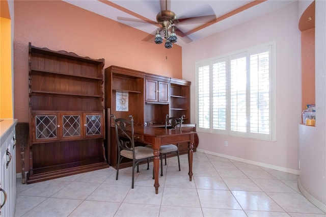 office featuring light tile patterned floors, ceiling fan, and baseboards