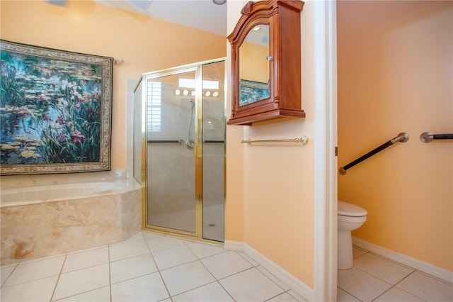 bathroom featuring a stall shower, tile patterned flooring, a garden tub, and toilet