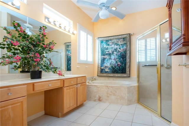 bathroom featuring vanity, a shower stall, and a wealth of natural light