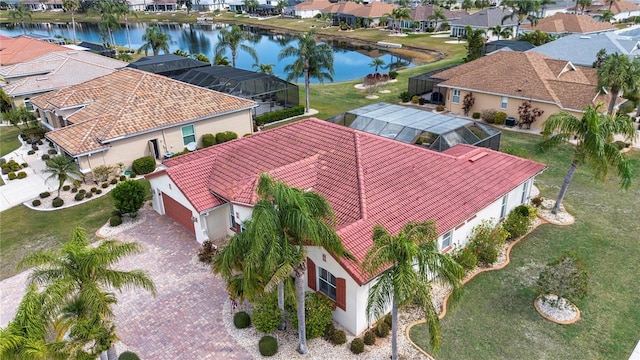 aerial view with a water view and a residential view