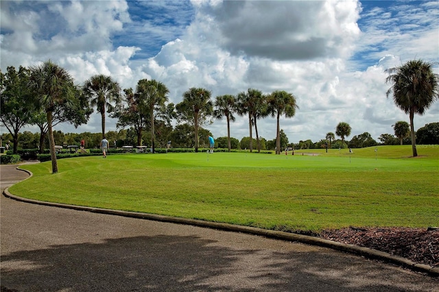 view of home's community featuring view of golf course