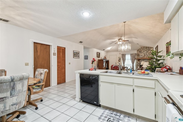 kitchen featuring dishwasher, lofted ceiling, sink, white cabinets, and stove