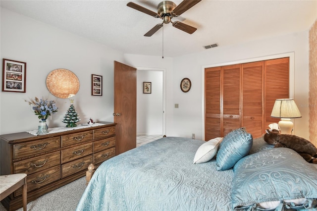 bedroom featuring a closet and ceiling fan