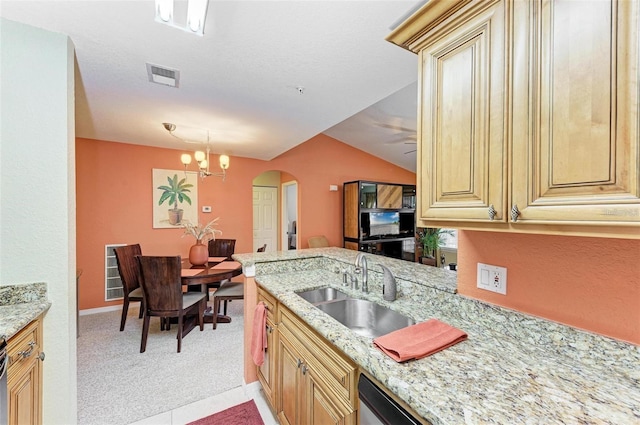 kitchen with light colored carpet, light stone countertops, and sink