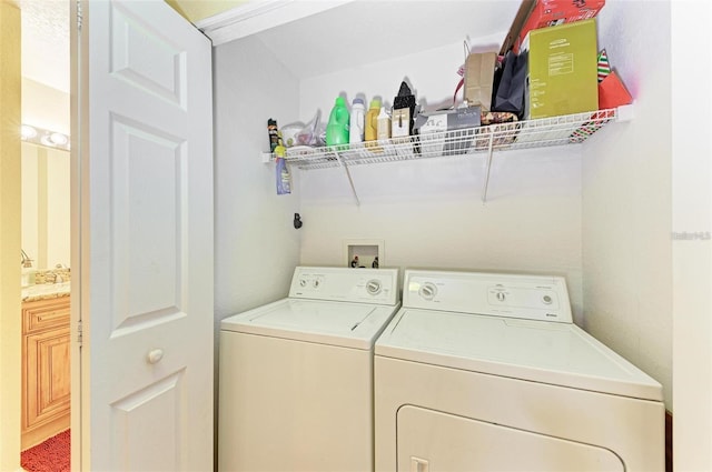 laundry area with independent washer and dryer