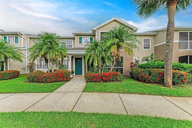 view of front facade with a front yard