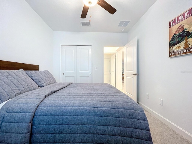 bedroom featuring carpet floors, a closet, and ceiling fan