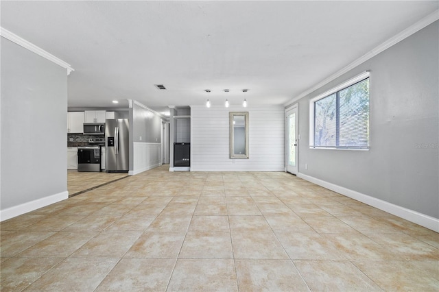 unfurnished living room with crown molding and light tile patterned floors