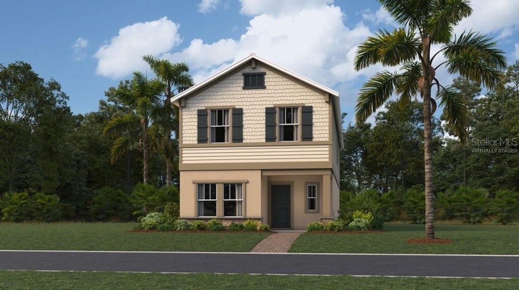 view of front property featuring a front lawn