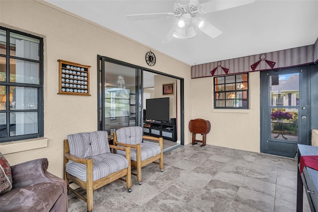 view of patio / terrace featuring ceiling fan