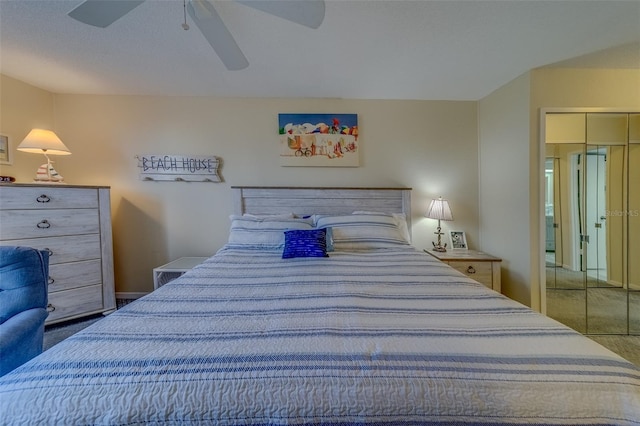 carpeted bedroom featuring ceiling fan