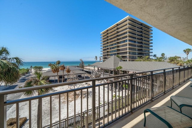 balcony featuring a water view