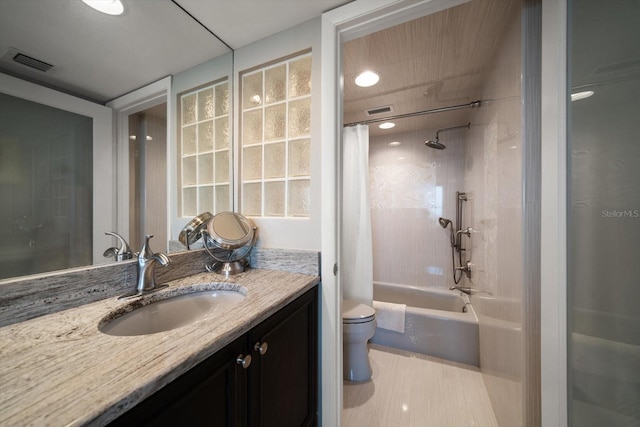 full bathroom with toilet, vanity, and shower / bathtub combination with curtain