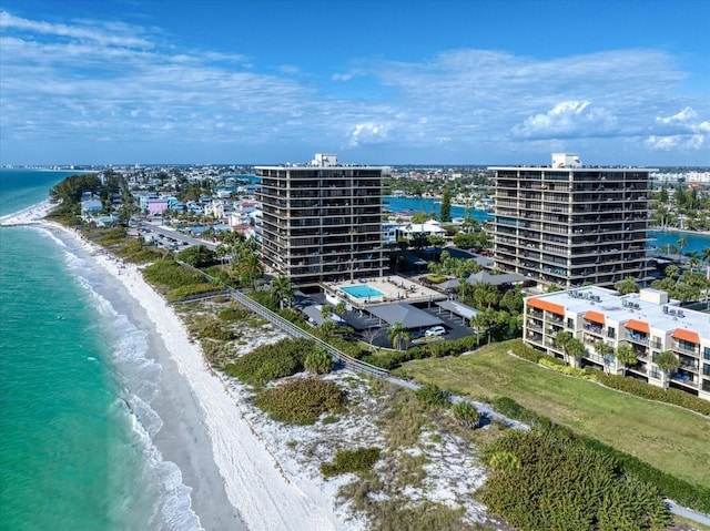 drone / aerial view with a view of the beach and a water view