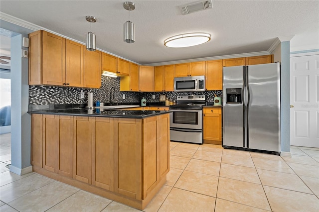 kitchen with crown molding, appliances with stainless steel finishes, hanging light fixtures, and light tile patterned floors