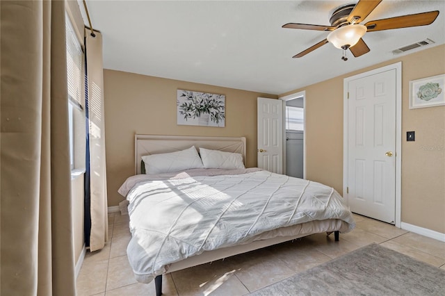 bedroom featuring ceiling fan and light tile patterned floors