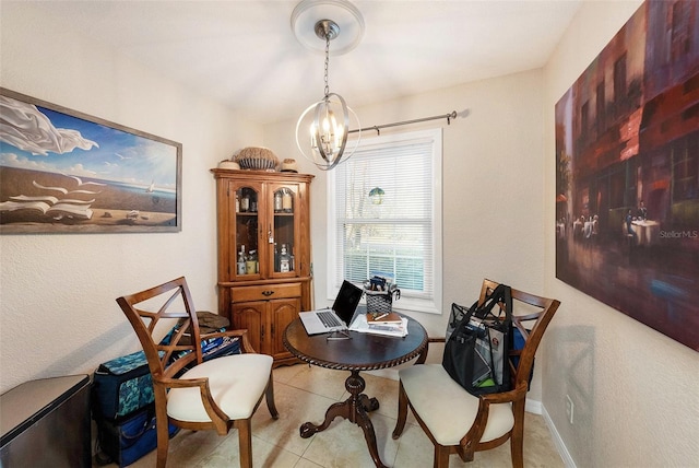 dining room with light tile patterned flooring and a notable chandelier