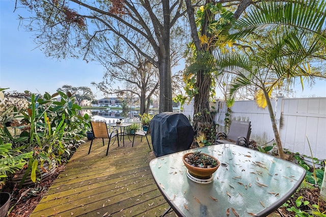 wooden terrace with grilling area