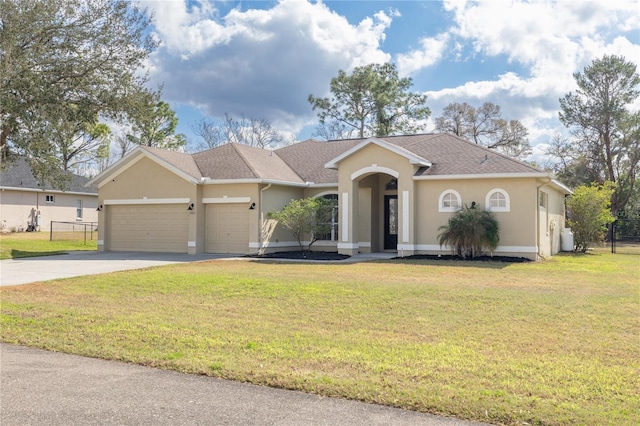 view of front of property featuring roof with shingles, stucco siding, a front yard, a garage, and driveway