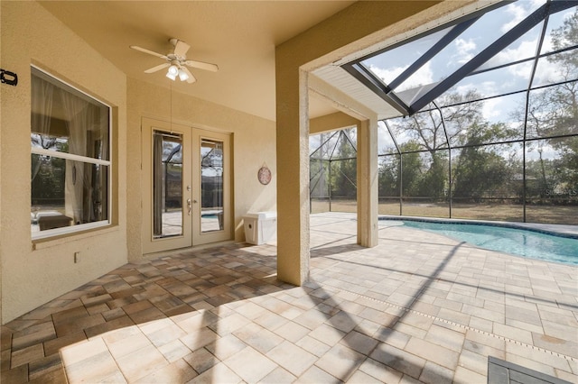 exterior space with french doors and ceiling fan