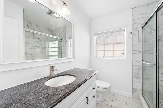 full bath featuring toilet, a baseboard heating unit, vanity, baseboards, and a stall shower