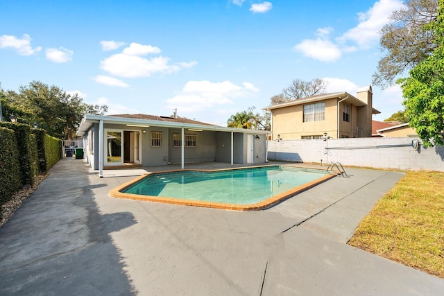 view of pool with a patio area, a fenced backyard, and a fenced in pool