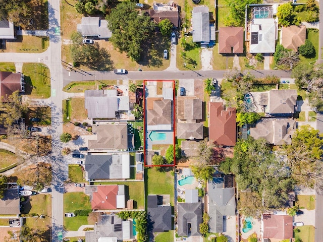 birds eye view of property with a residential view