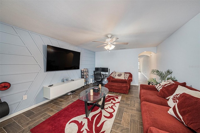 10944 Keys Gate Dr, Riverview, FL 33579 - living room with a textured ceiling and ceiling fan