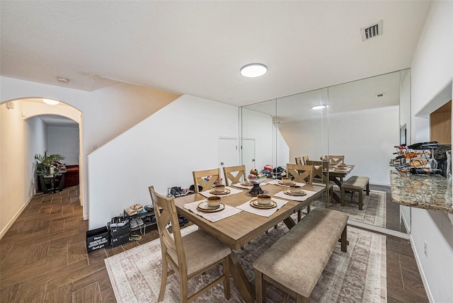 10944 Keys Gate Dr, Riverview, FL 33579 - dining room featuring dark parquet floors