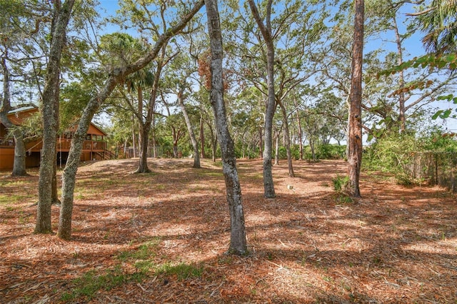 view of yard with a wooden deck