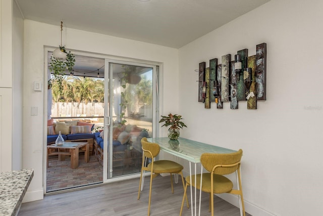 dining room with light wood-type flooring