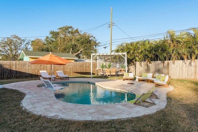 view of swimming pool featuring a pergola, a patio area, and a lawn