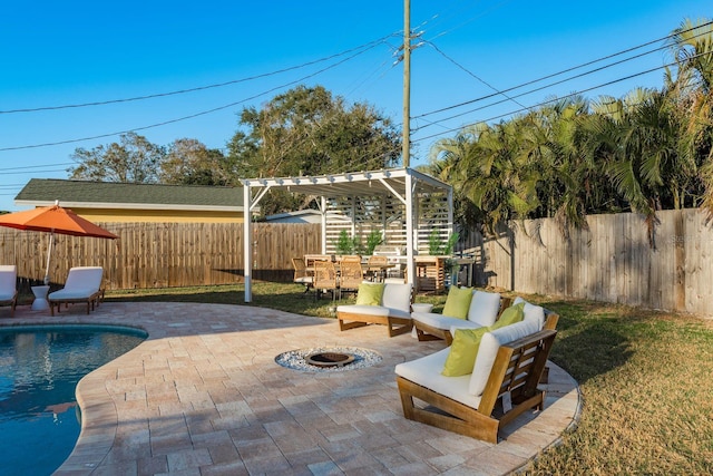 view of patio / terrace with a fenced in pool