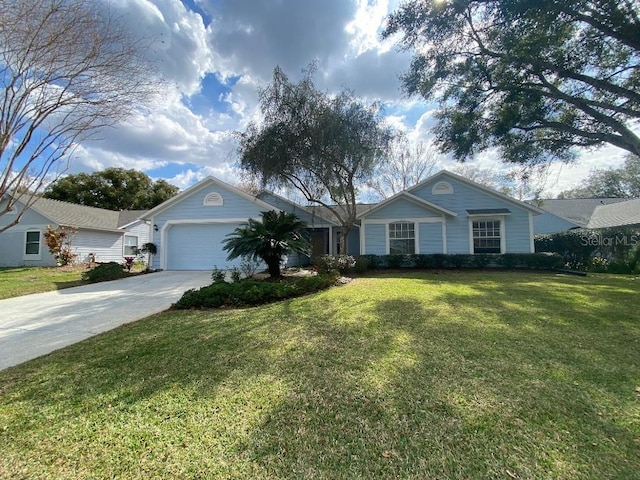 single story home featuring a garage and a front lawn