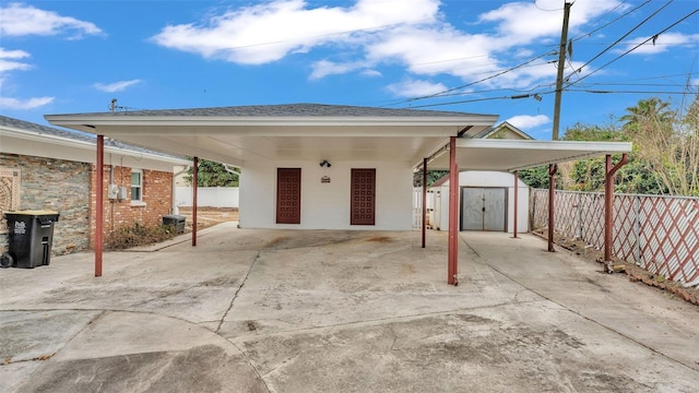 exterior space with cooling unit and a storage shed