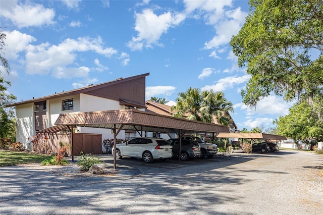 view of car parking with a carport