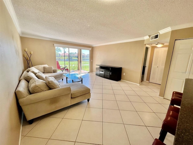 tiled living room with crown molding and a textured ceiling