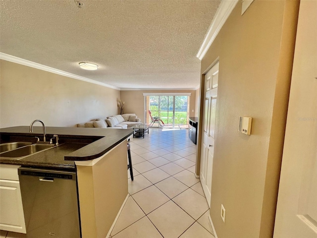 kitchen with white cabinetry, light tile patterned floors, crown molding, and dishwasher