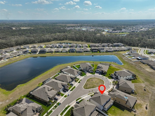 bird's eye view with a residential view and a water view