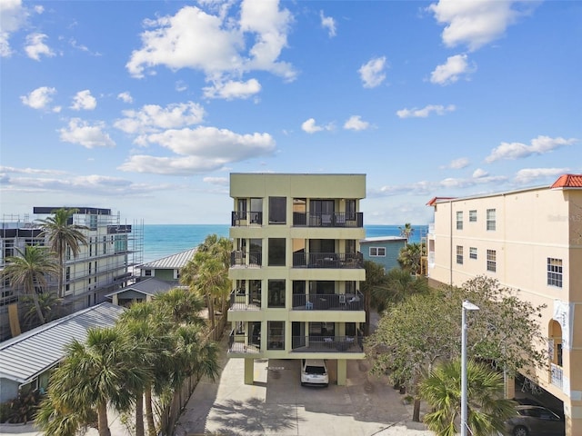 view of property with a water view