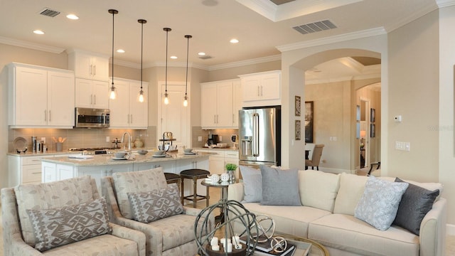 living room featuring ornamental molding