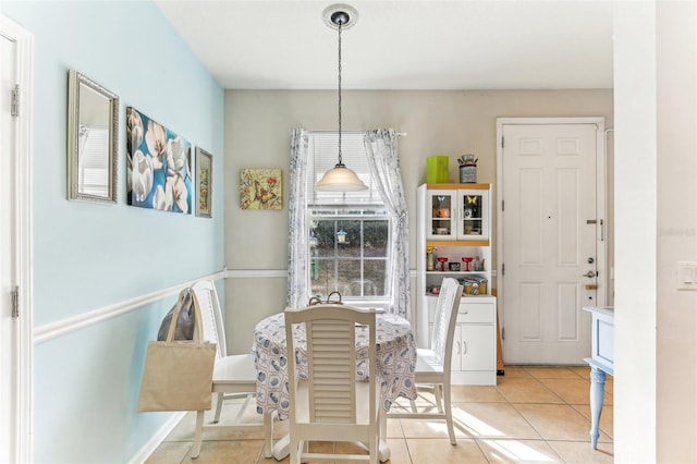 dining room featuring light tile patterned flooring