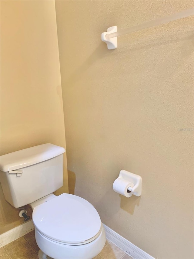 bathroom featuring toilet