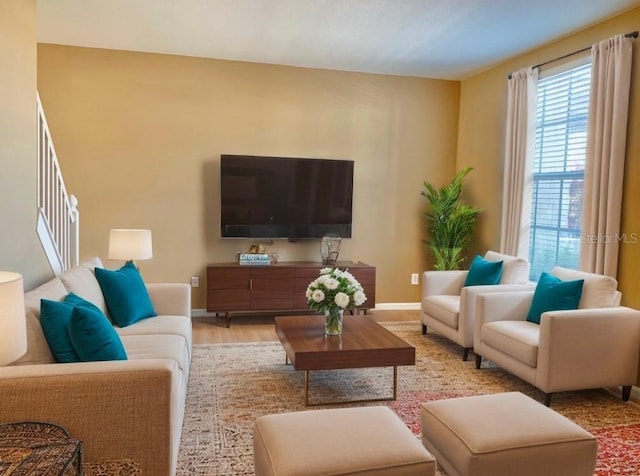 living room with light hardwood / wood-style floors