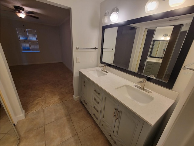 bathroom featuring ceiling fan, vanity, and tile patterned flooring